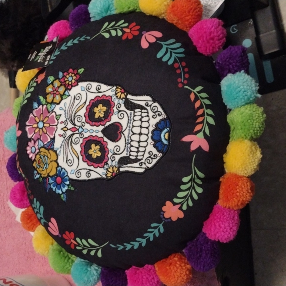 A decorative pillow with tags